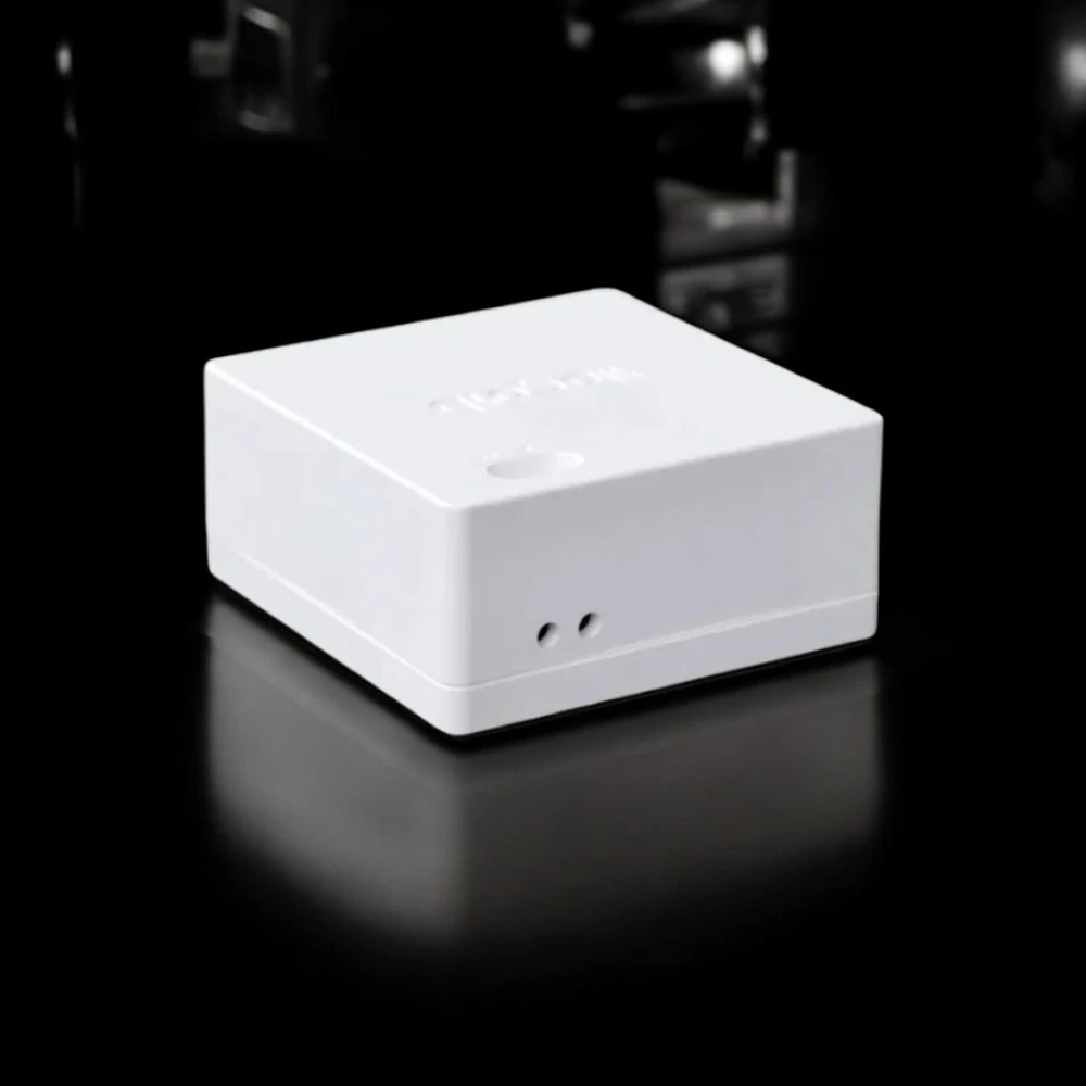 Dropair Mini 6s HVAC adapter on black reflective surface